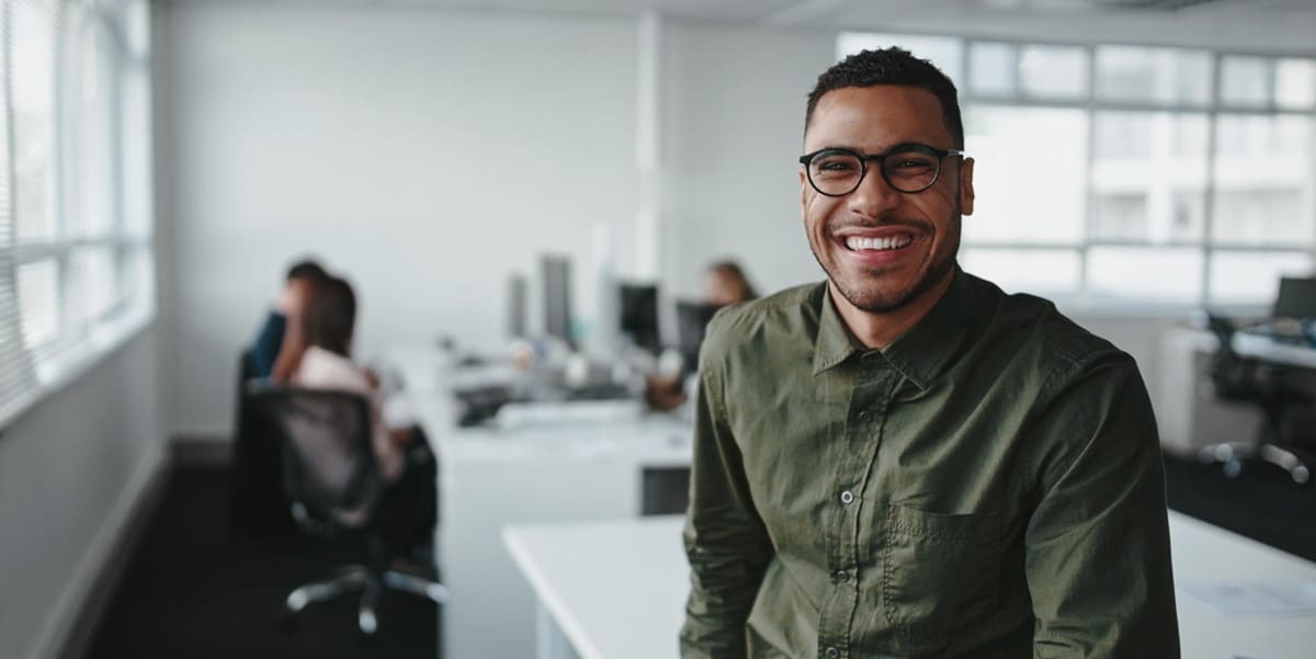 man smiling, office setting