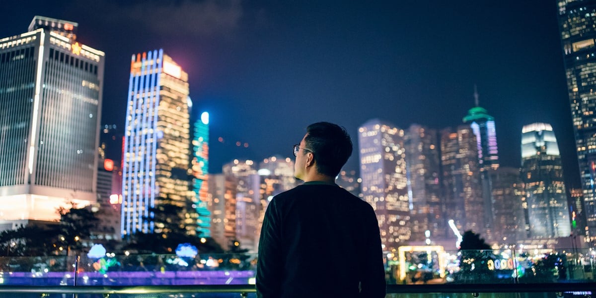 city scape, back of man looking at skyline