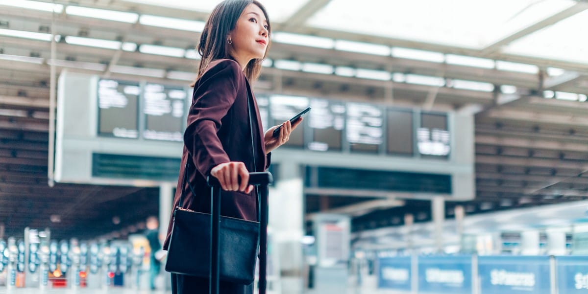 woman travelling through airport