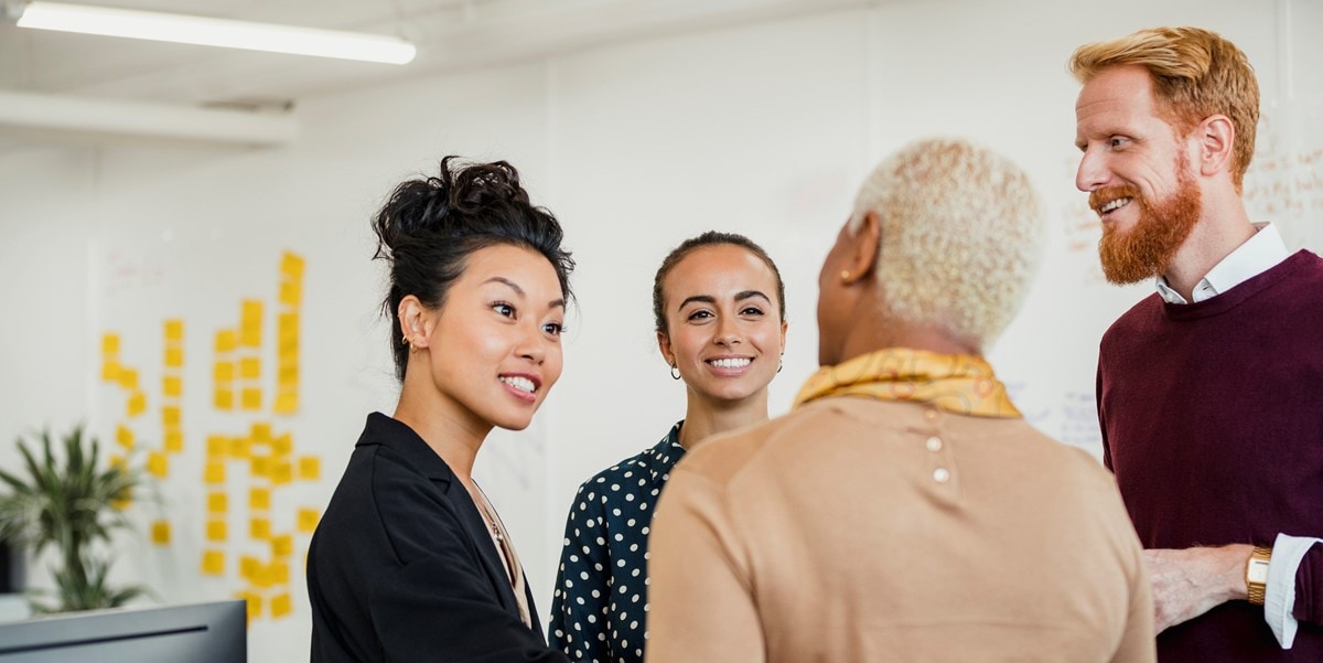 group of people talking at office